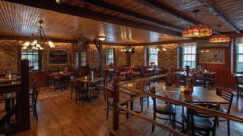 Dining room with many set tables